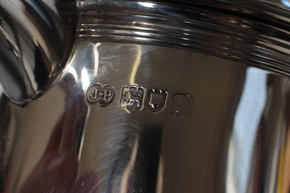 AN EDWARDIAN SILVER TANKARD Image