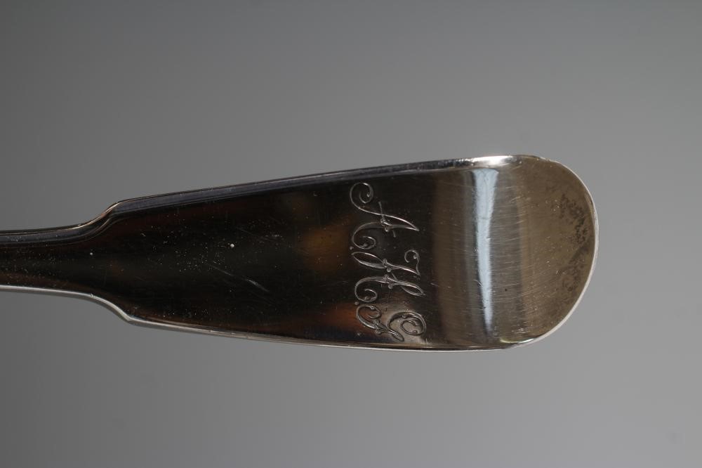 A LATE GEORGE III SILVER SOUP LADLE, maker's mark GB, London 1819, in Fiddle pattern, engraved Image