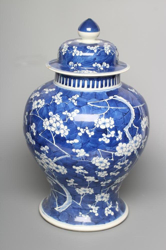 A CHINESE PORCELAIN LARGE JAR AND COVER of inverted baluster form, painted in underglaze blue with Image