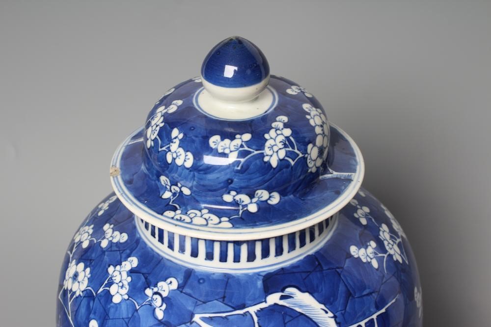 A CHINESE PORCELAIN LARGE JAR AND COVER of inverted baluster form, painted in underglaze blue with Image