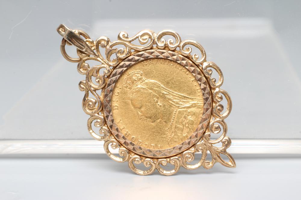 A VICTORIA J.H. SOVEREIGN, 1888, in a 9ct gold loose pendant mount, London 1974, 13.6g (Est. plus Image