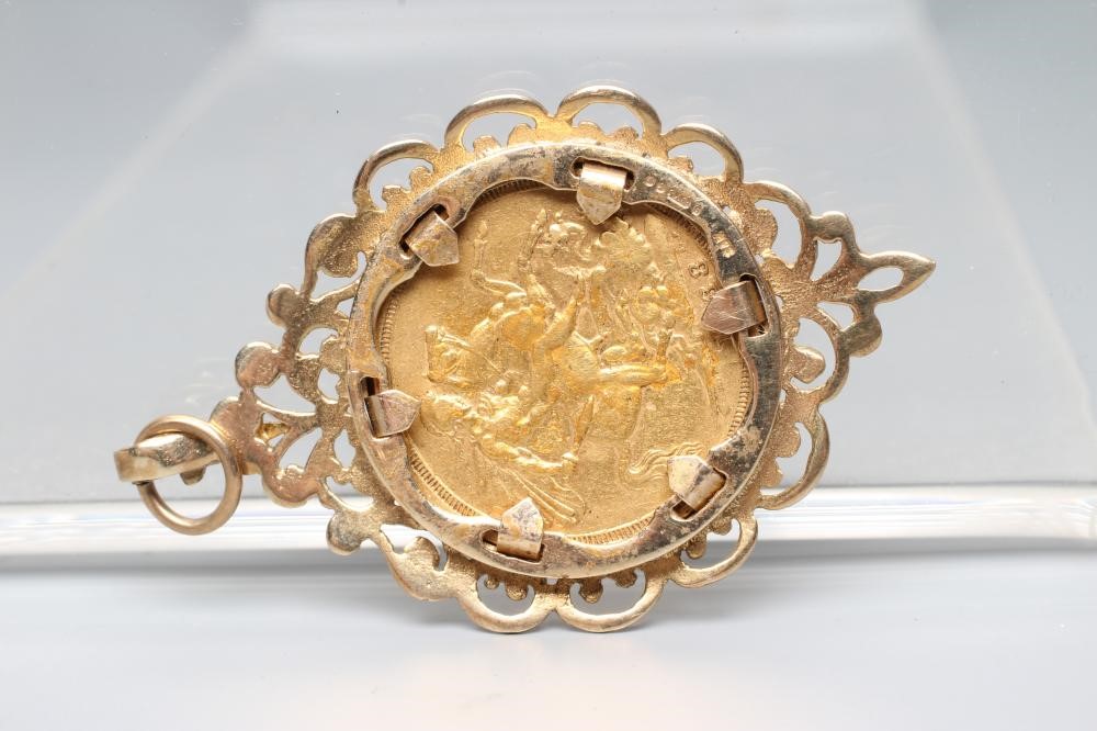 A VICTORIA J.H. SOVEREIGN, 1888, in a 9ct gold loose pendant mount, London 1974, 13.6g (Est. plus Image