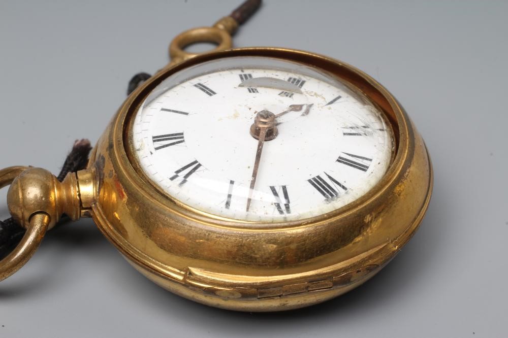 A GILT METAL PAIR CASED POCKET WATCH Image