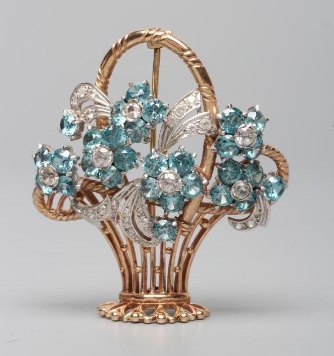 A TOPAZ AND DIAMOND FLOWER BASKET BROOCH Image