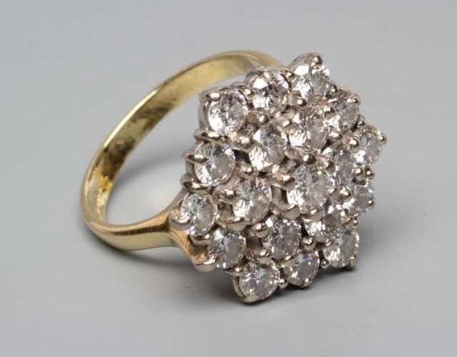 A DIAMOND CLUSTER RING Image