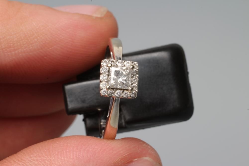 A DIAMOND CLUSTER RING Image