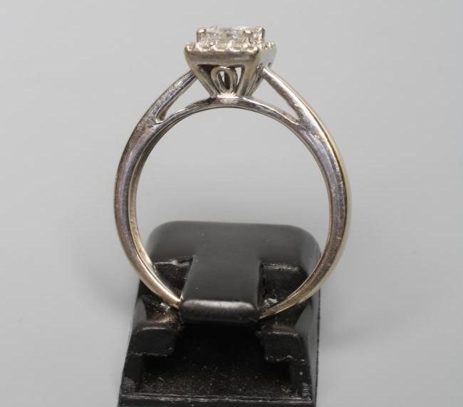 A DIAMOND CLUSTER RING Image