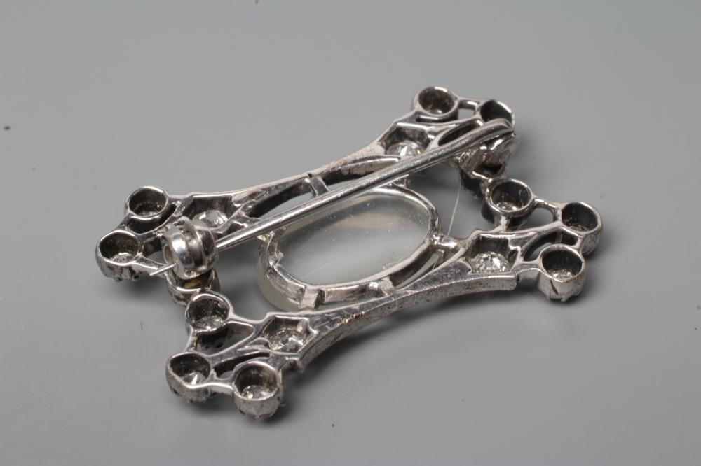 AN EDWARDIAN DIAMOND AND MOONSTONE BROOCH Image