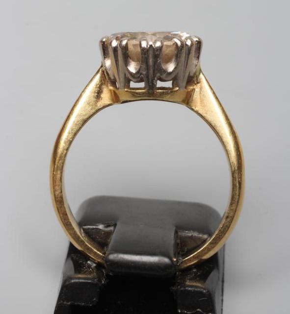 A SOLITAIRE DIAMOND RING, the round brilliant cut stone of approximately 2.35cts, claw set to a Image