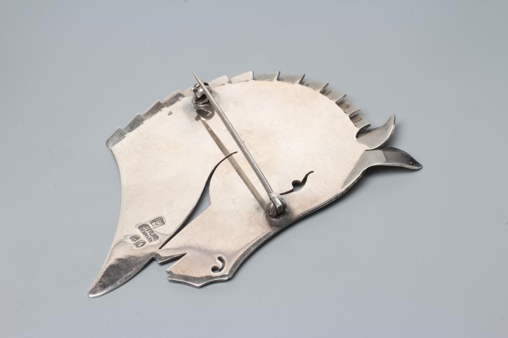 A GEORG JENSEN SILVER HORSE HEAD BROOCH designed by Arno Malinowski, stamped and numbered 90 Image
