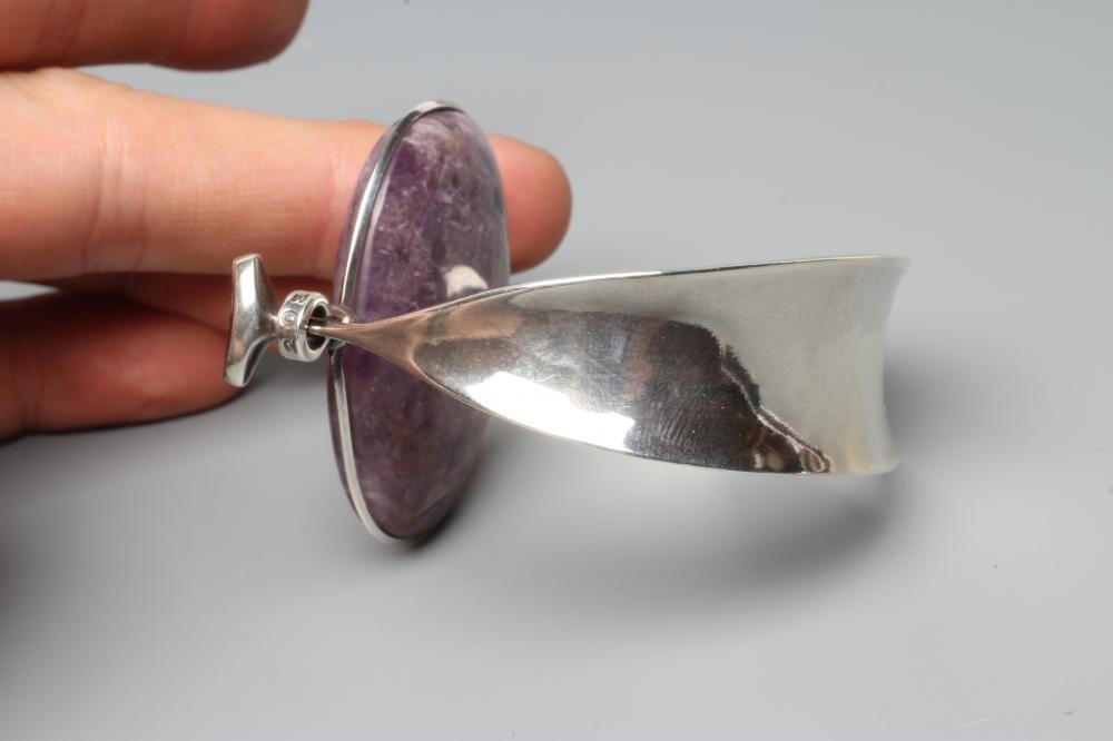 A GEORG JENSEN SILVER BANGLE designed by Vivianna Torun Bulow-Hube Image