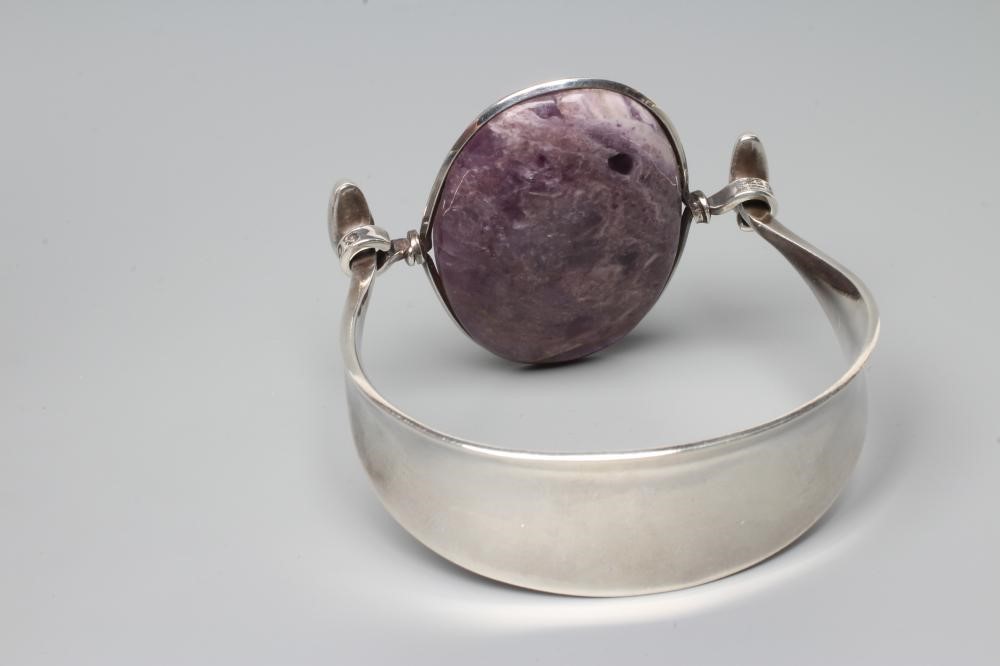 A GEORG JENSEN SILVER BANGLE designed by Vivianna Torun Bulow-Hube Image