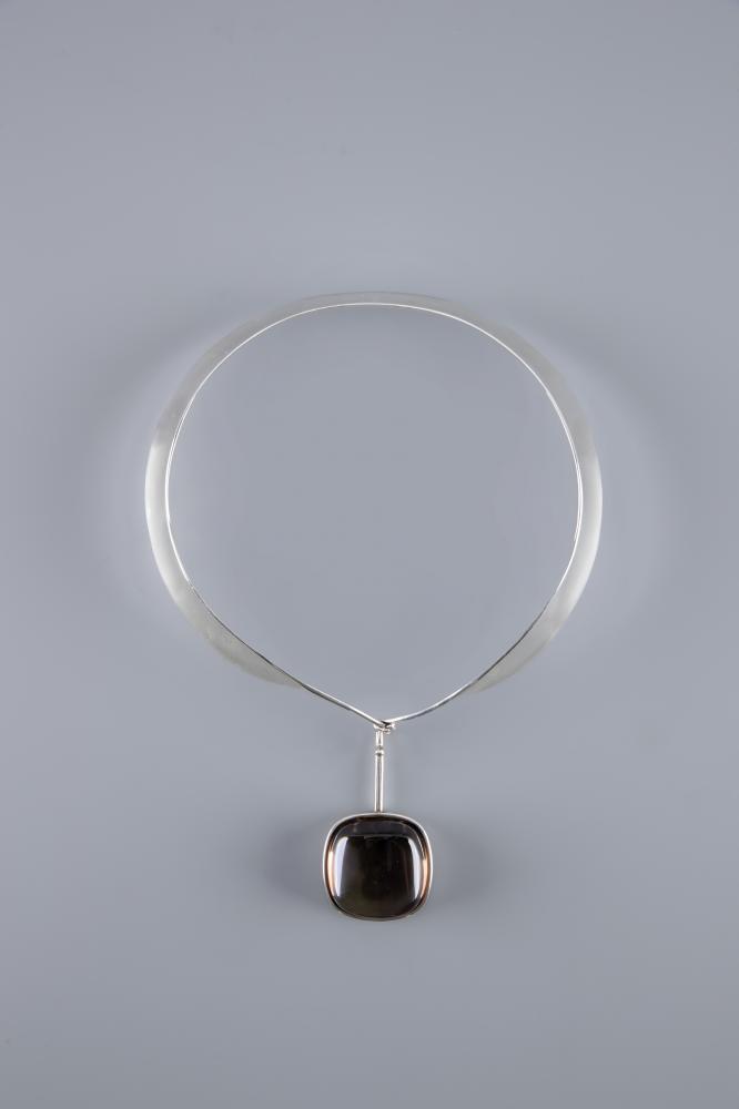 A GEORG JENSEN SILVER NECK RING designed by Vivianna Torun Bulow-Hube Image