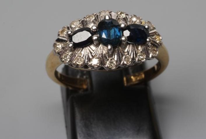 A SAPPHIRE AND DIAMOND DRESS RING Image