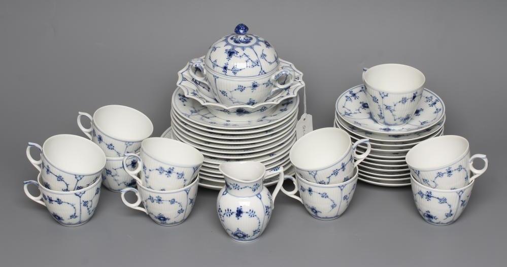 A ROYAL COPENHAGEN PORCELAIN PART TEA SERVICE painted in underglaze blue with the Onion pattern Image