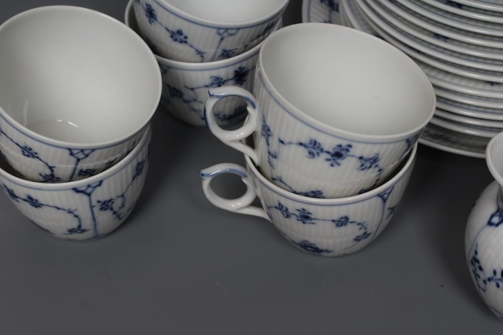 A ROYAL COPENHAGEN PORCELAIN PART TEA SERVICE painted in underglaze blue with the Onion pattern Image