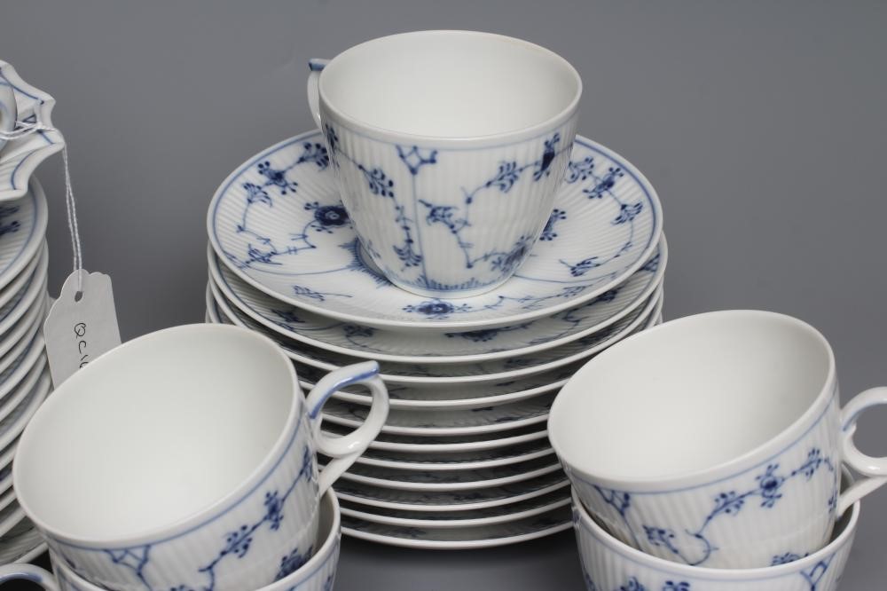 A ROYAL COPENHAGEN PORCELAIN PART TEA SERVICE painted in underglaze blue with the Onion pattern Image