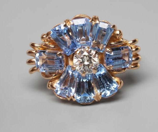 AN AQUAMARINE AND DIAMOND COCKTAIL RING Image