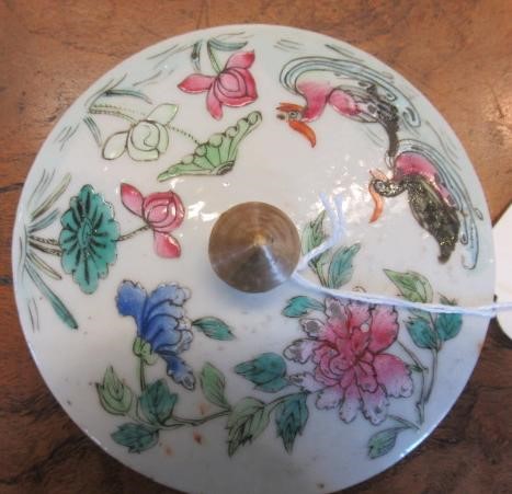 A CHINESE PORCELAIN CYLINDRICAL THREE TIER STACKING BOX AND COVER painted in pastel enamels with Image