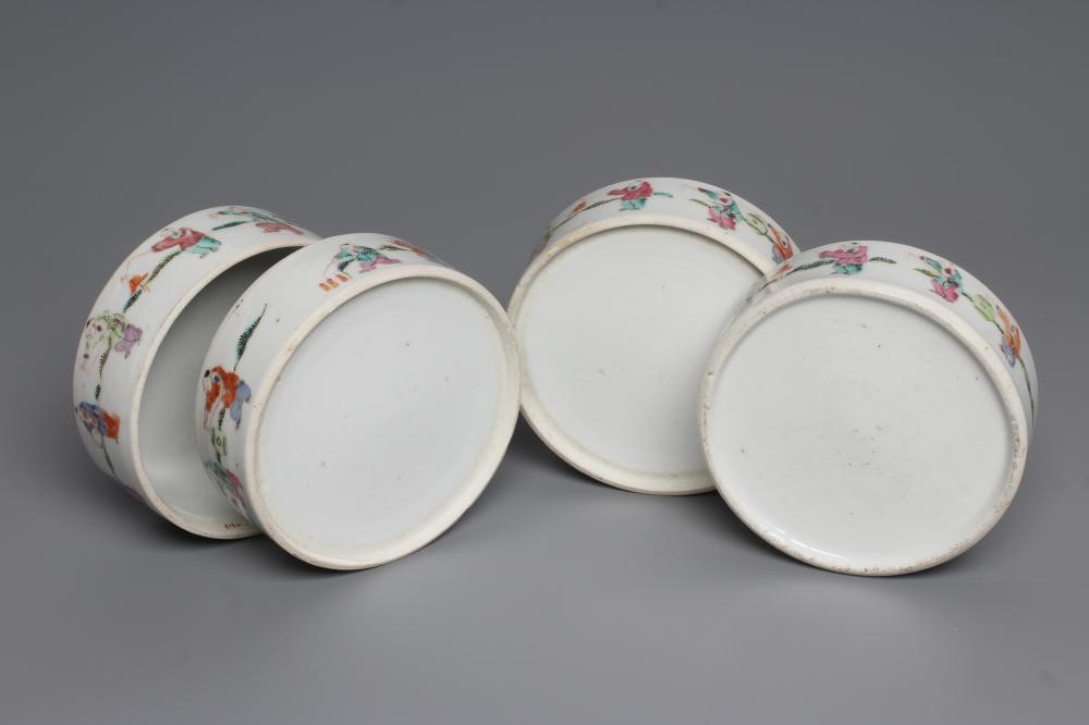 A CHINESE PORCELAIN CYLINDRICAL THREE TIER STACKING BOX AND COVER painted in pastel enamels with Image