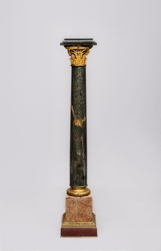 A GREEN AND ROUGE MARBLE PEDESTAL Image