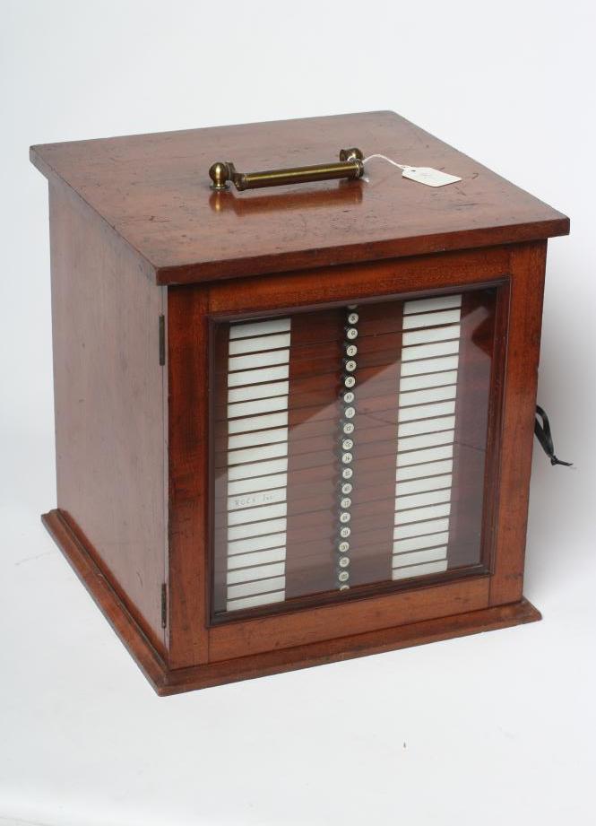 A MAHOGANY TABLE SPECIMEN CABINET Image