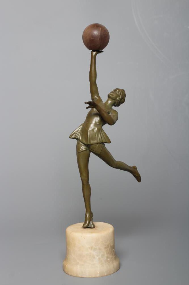 AN ART DECO green patinated spelter figure in the style of Lorenzl Image