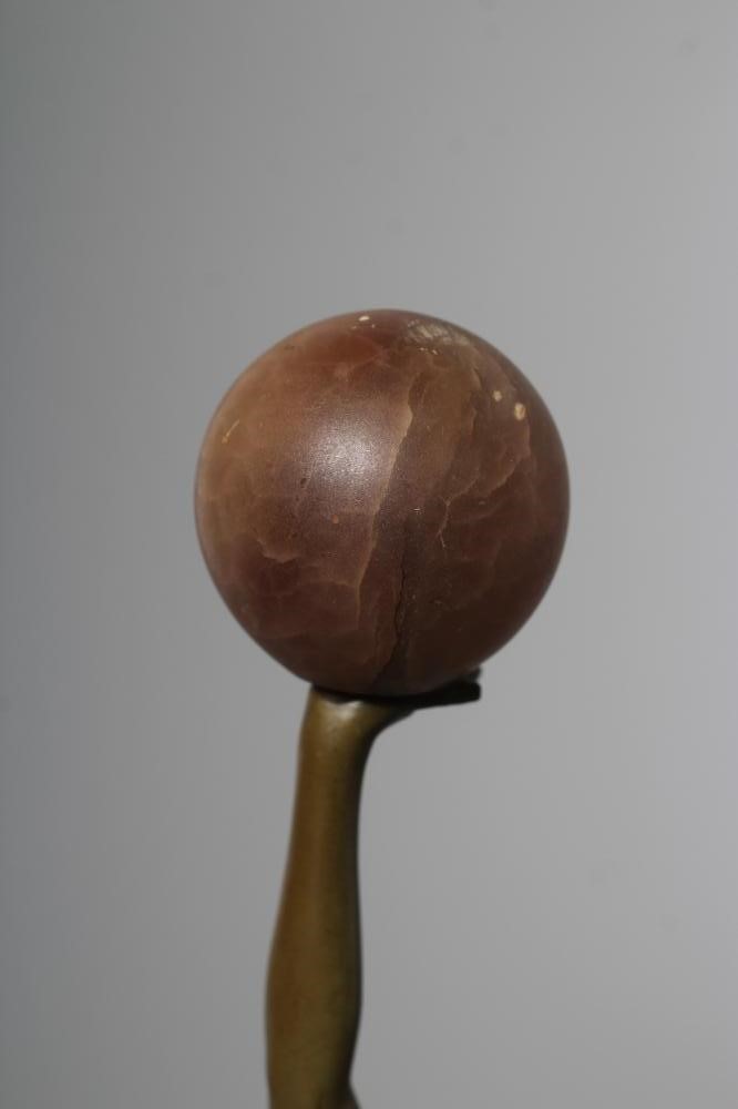 AN ART DECO green patinated spelter figure in the style of Lorenzl Image