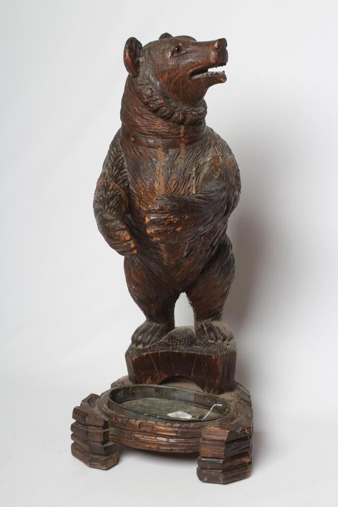 A CARVED WOOD BLACK FOREST BEAR STICK STAND Image