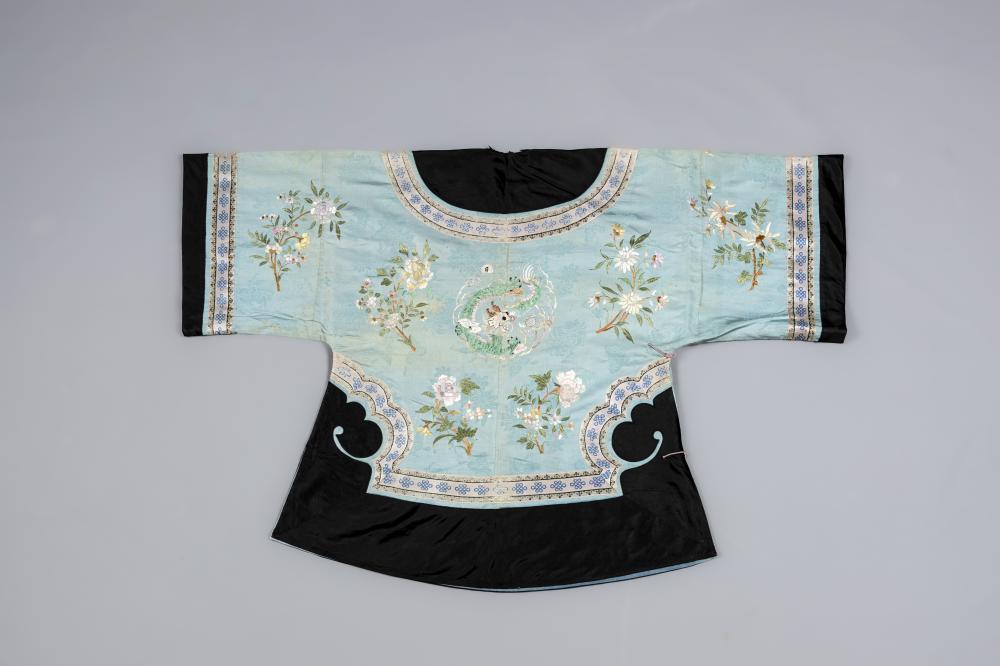 A CHINESE SILK ROBE embroidered in coloured silks with flowers Image