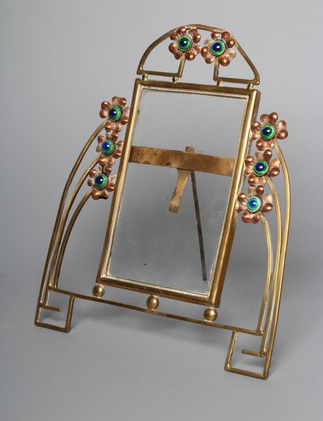A GERMAN JUGENDSTIL BRASS STRUT BACK PHOTOGRAPH FRAME Image