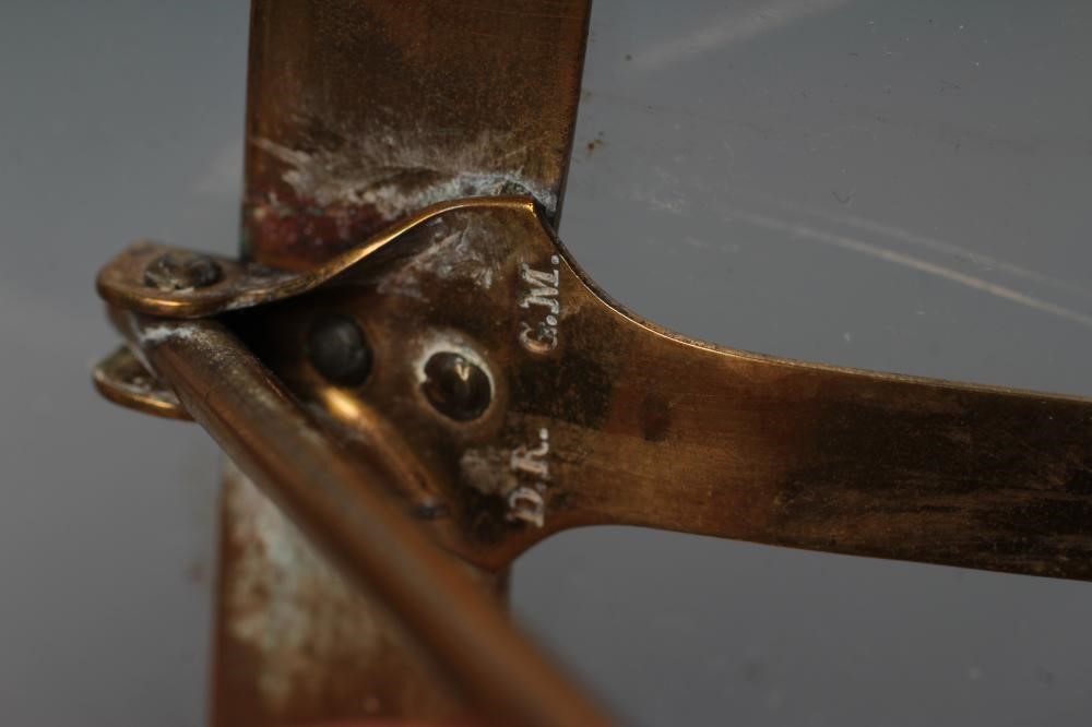 A GERMAN JUGENDSTIL BRASS STRUT BACK PHOTOGRAPH FRAME Image