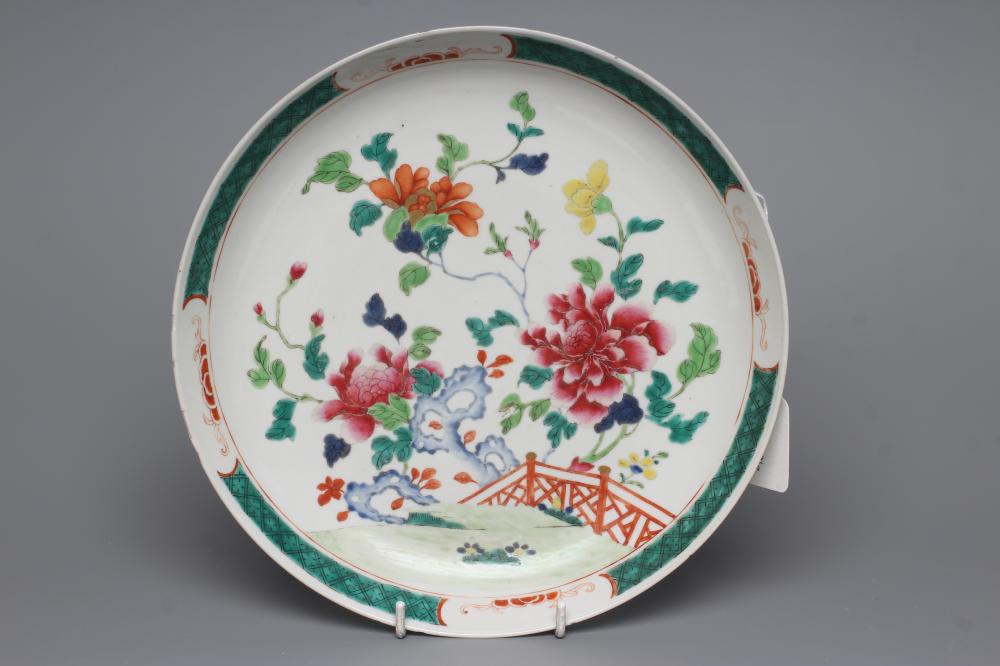 A CHINESE PORCELAIN SAUCER DISH of plain circular form painted in colours with large flowers Image