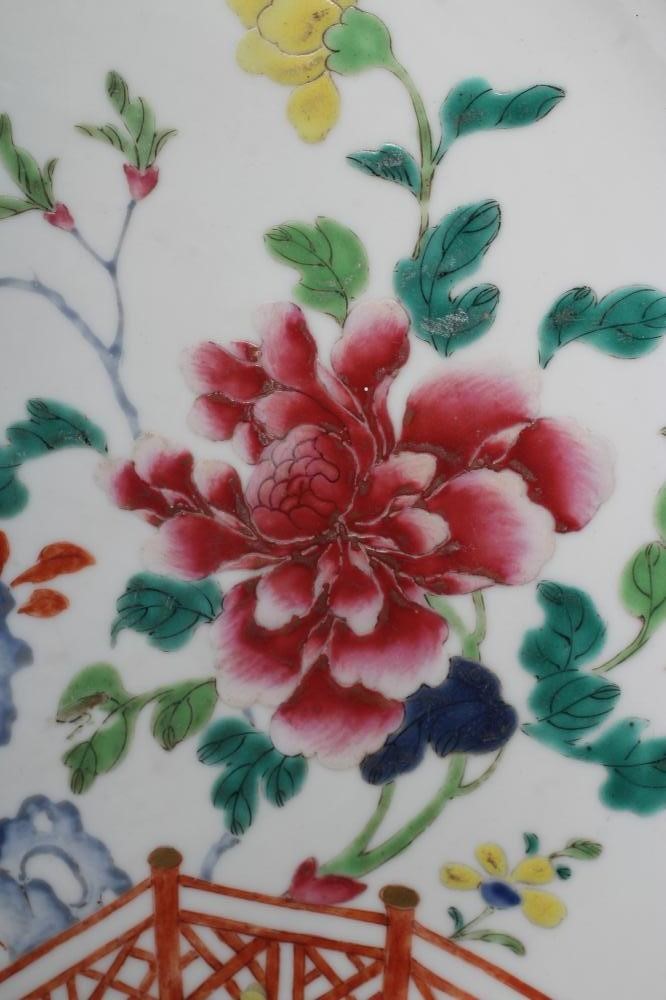 A CHINESE PORCELAIN SAUCER DISH of plain circular form painted in colours with large flowers Image