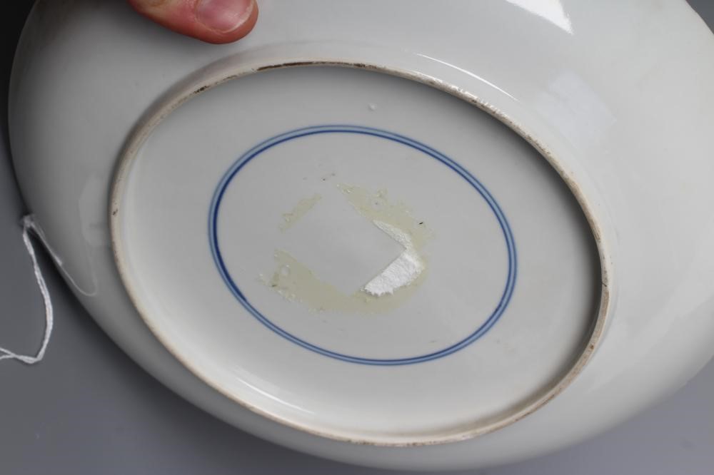 A CHINESE PORCELAIN SAUCER DISH of plain circular form painted in colours with large flowers Image
