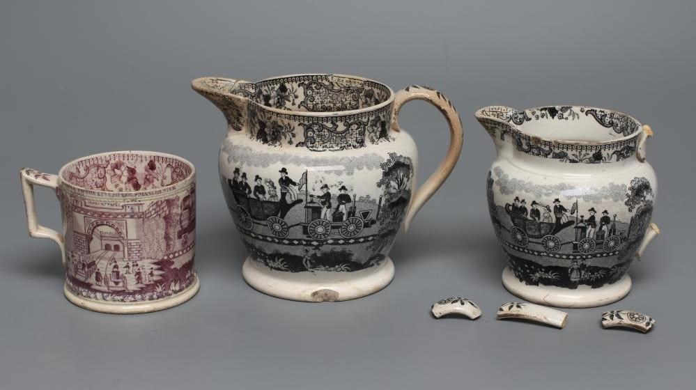 OF RAILWAY INTEREST - two graduated Staffordshire pottery "Dutch" jugs printed in underglaze black Image
