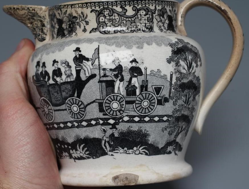 OF RAILWAY INTEREST - two graduated Staffordshire pottery "Dutch" jugs printed in underglaze black Image