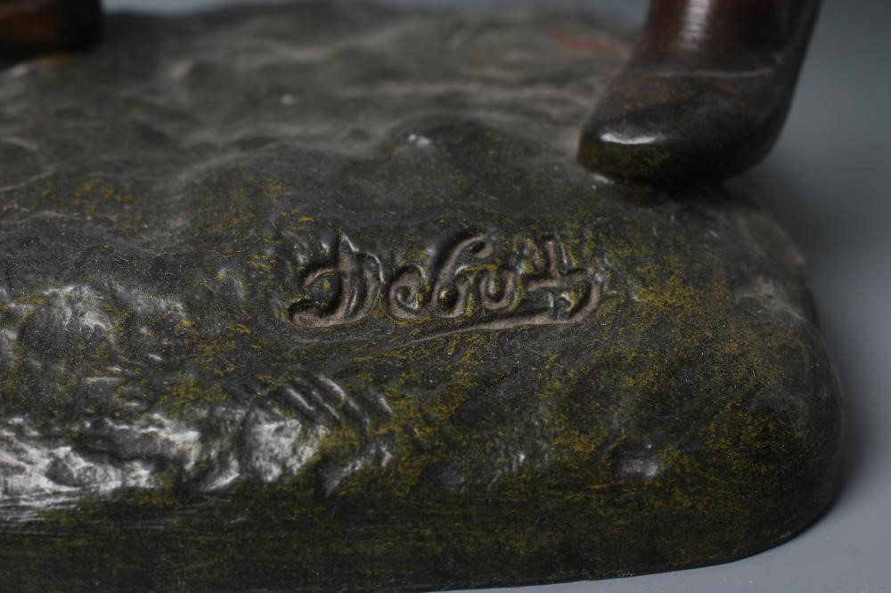 A PAIR OF PAINTED SPELTER ARAB MALE WATER CARRIERS, after Marcel Debut (1865-1933) each modelled Image