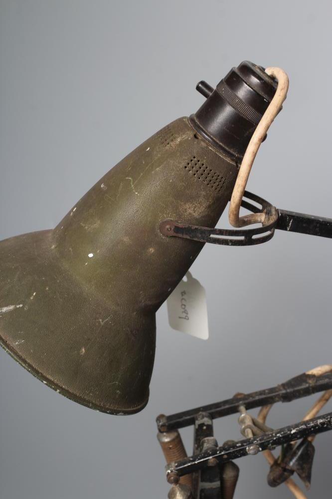 A HERBERT TERRY AND SONS BLACK ANGLE POISE LAMP, 1930's, the metal alloy shade with Crabtree Image