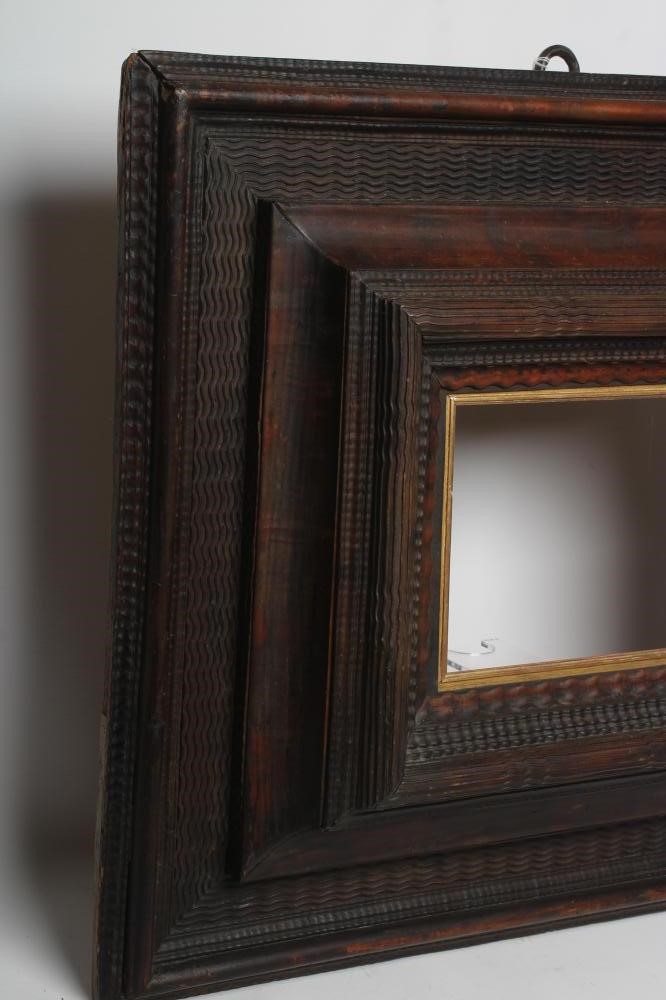 A DUTCH RIPPLE MOULDED FRAME, 17th century, with gilded slip to take picture 12 3/4" x 10 1/4", 30" Image