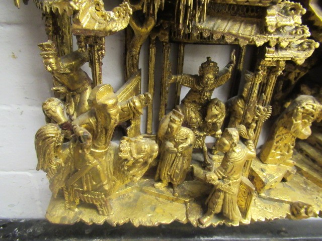 A CHINESE CARVED AND PIERCED GILTWOOD PANEL Image