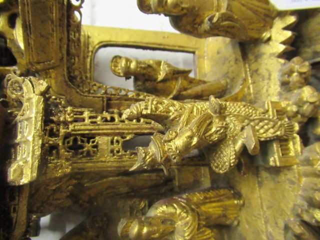 A CHINESE CARVED AND PIERCED GILTWOOD PANEL Image