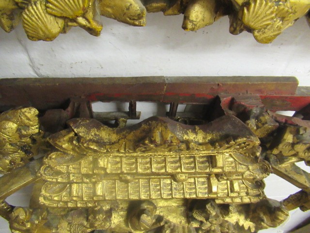 A CHINESE CARVED AND PIERCED GILTWOOD PANEL Image