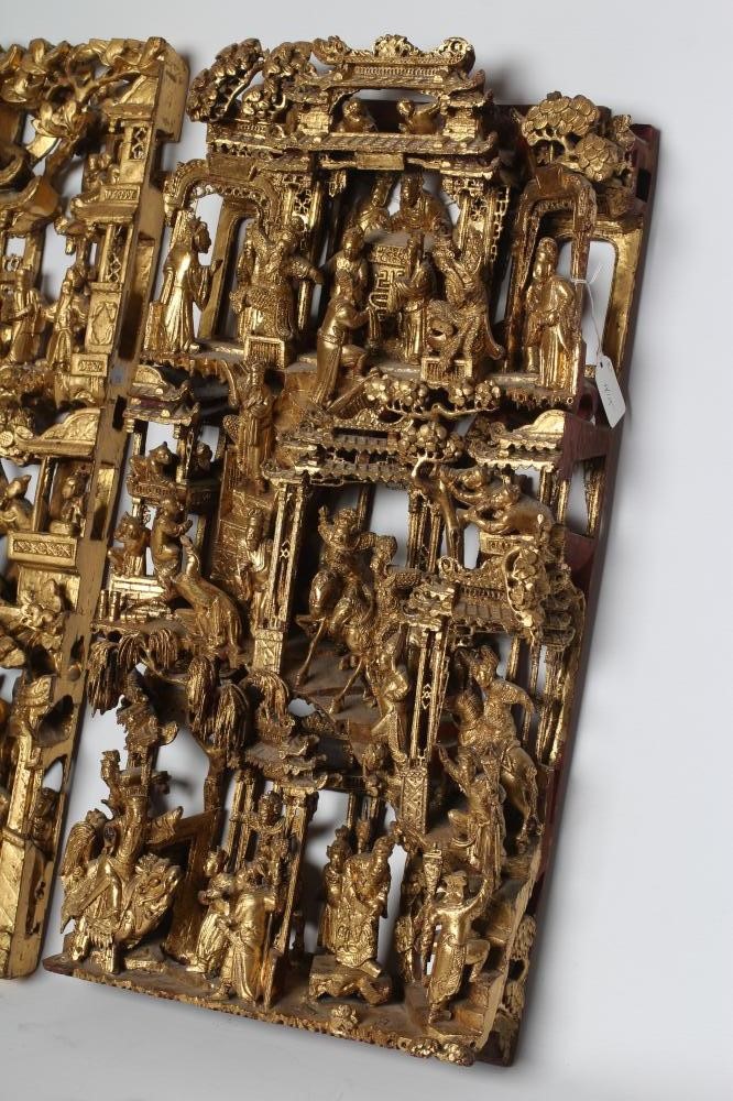 A CHINESE CARVED AND PIERCED GILTWOOD PANEL Image