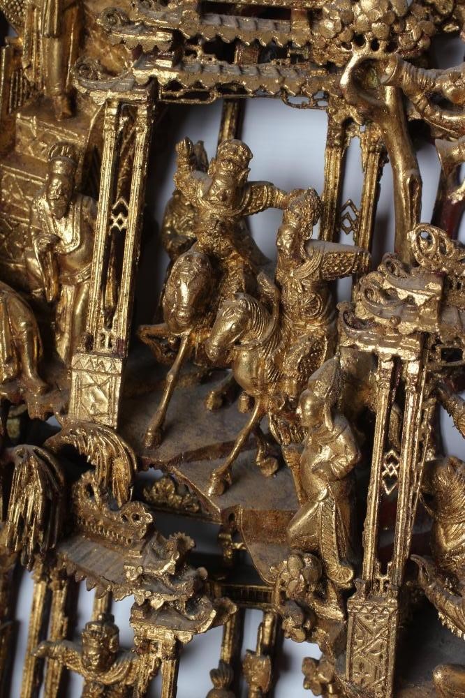 A CHINESE CARVED AND PIERCED GILTWOOD PANEL Image
