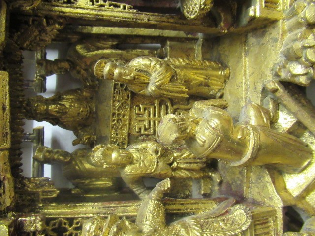 A CHINESE CARVED AND PIERCED GILTWOOD PANEL Image