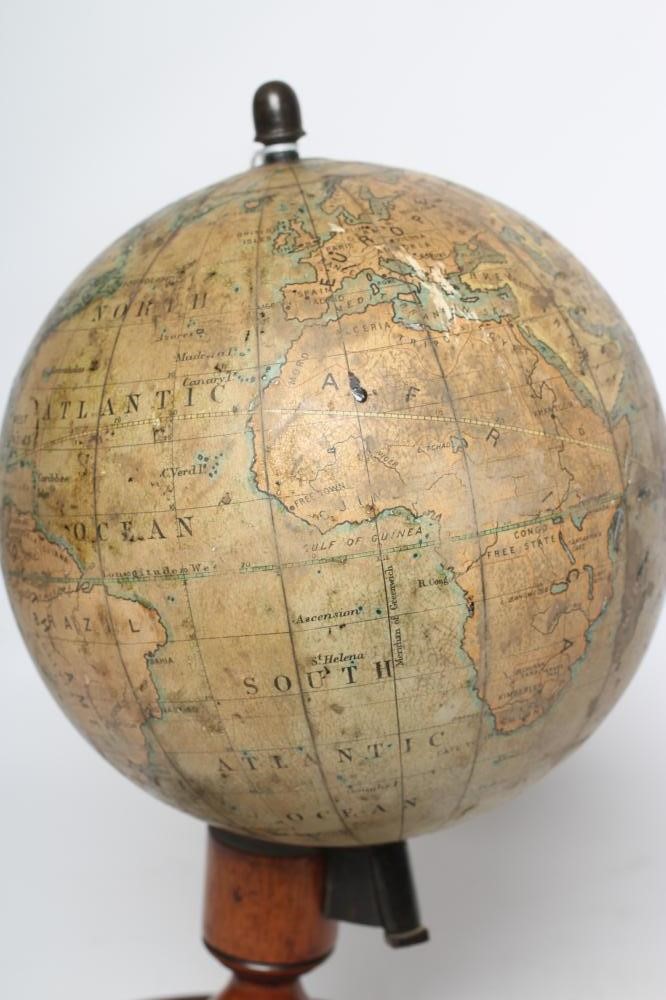 A DESK TOP EDUCATIONAL TERRESTRIAL GLOBE by C Smith & Sons London, early 20th century, the mahogany Image
