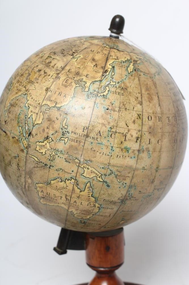 A DESK TOP EDUCATIONAL TERRESTRIAL GLOBE by C Smith & Sons London, early 20th century, the mahogany Image