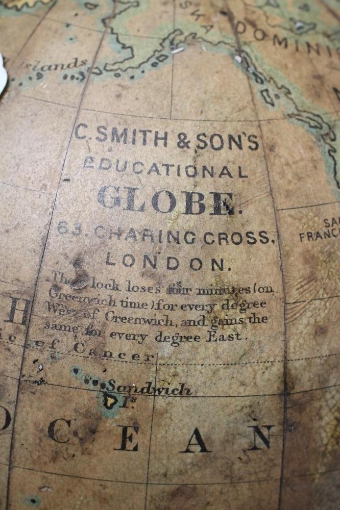 A DESK TOP EDUCATIONAL TERRESTRIAL GLOBE by C Smith & Sons London, early 20th century, the mahogany Image