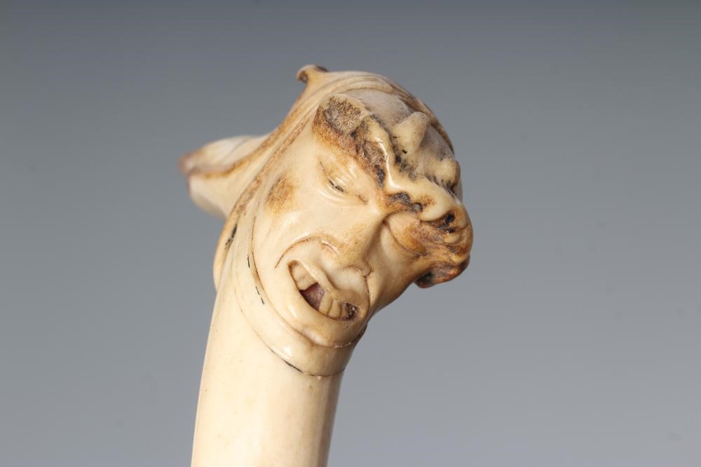 TWO GROTESQUE NOVELTY WALKING CANES Image